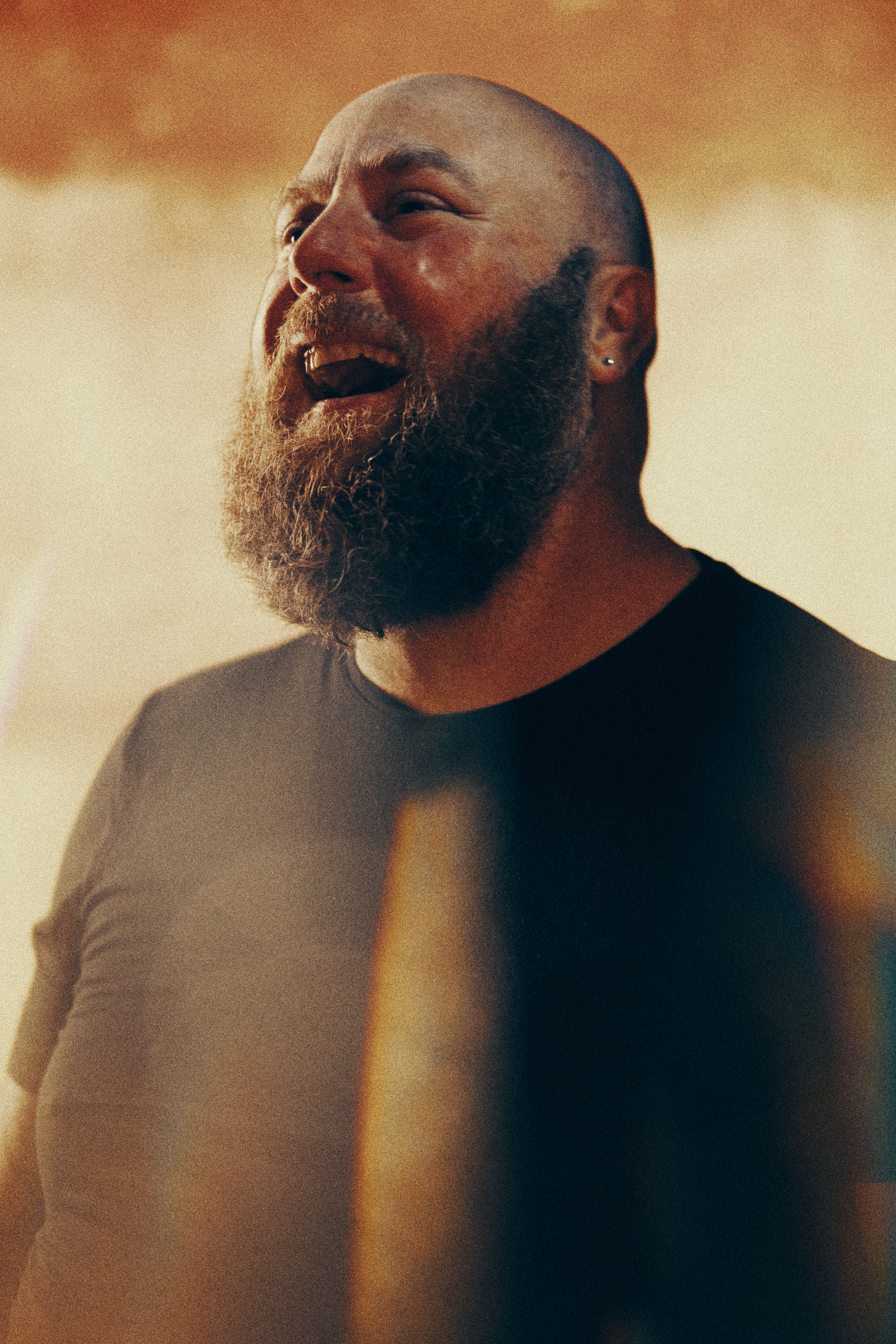 James Todd laughing, photographed by Jeremy Cowart